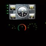 Display of real-time vehicle information such as speedometer gauge and other data on an aftermarket car radio