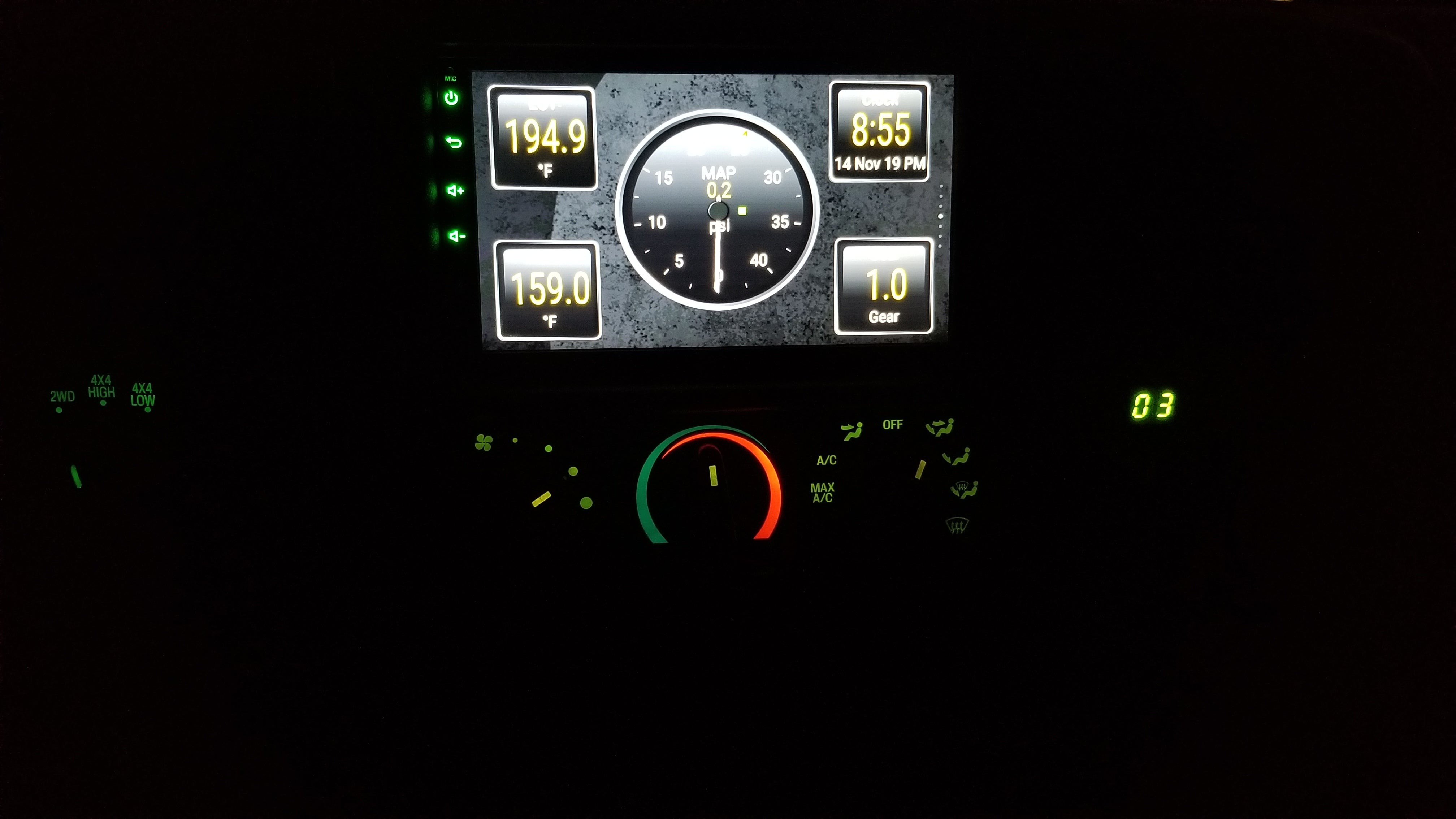Display of real-time vehicle information such as speedometer gauge and other data on an aftermarket car radio