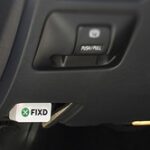 Fixd OBD2 adapter connected to a car's OBD-II port