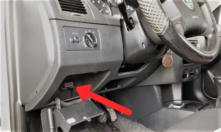 Vehicle's OBD2 port under dashboard