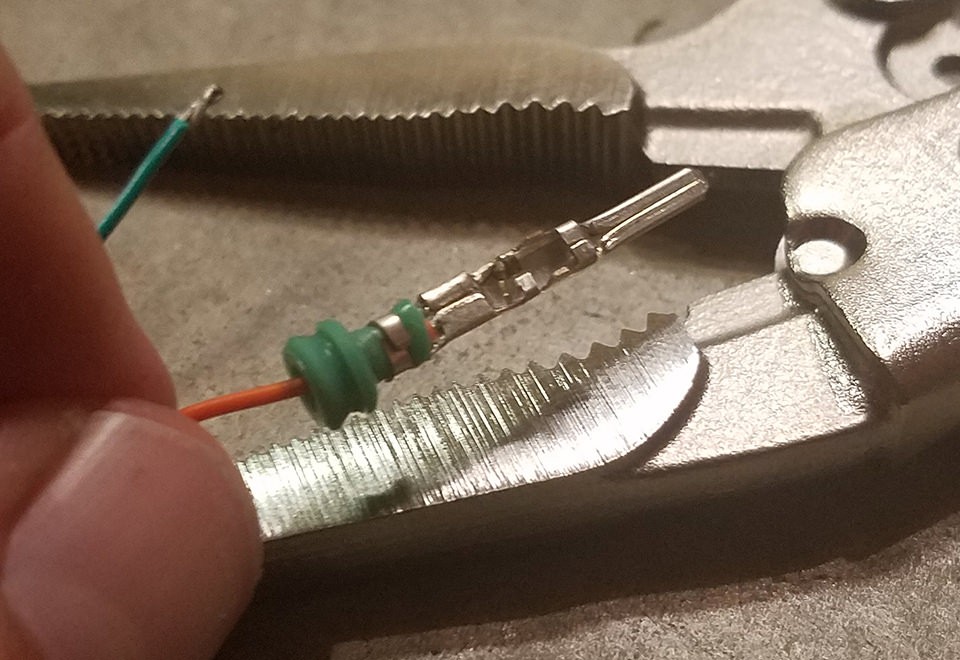 Sealed pin connector