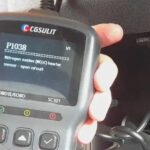 OBD2 Scanner displaying diagnostic codes