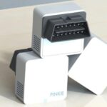 Pinkie OBD2 Adapter Connected to Car
