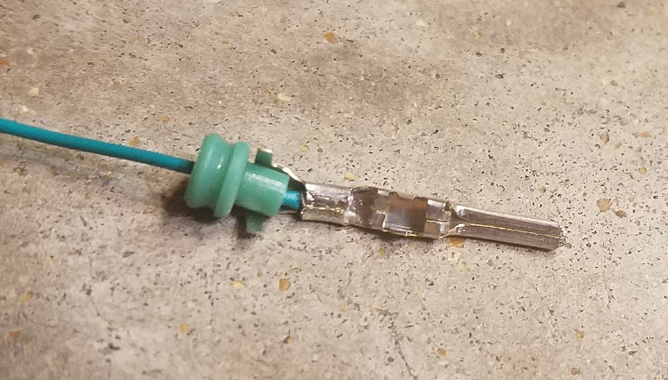Folding prongs over seal