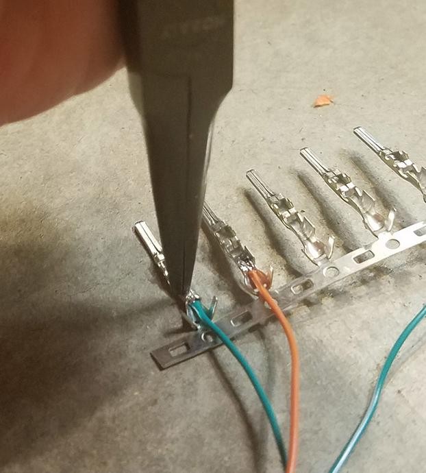 Crimped pin connector
