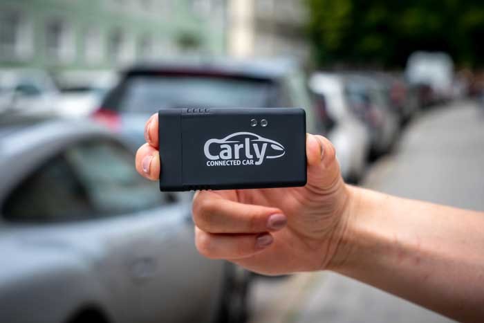OBD2 scanner connected to a car's OBD2 port